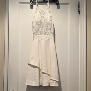 Elegant creamy White Halter Dress with Embroidery in silver by Speechless